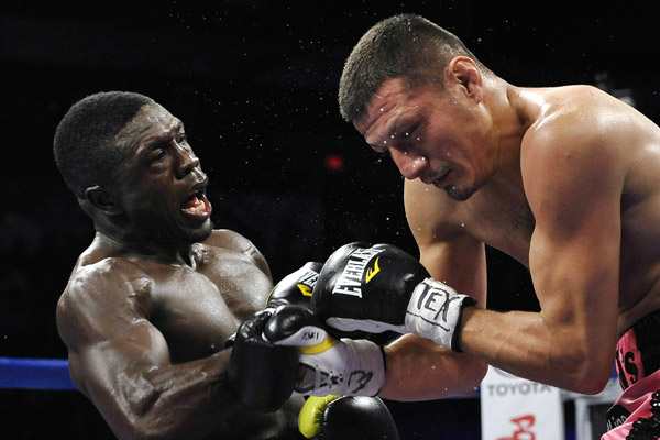 Andre Berto (left) tore his shoulder during his July 27 loss to Jesus Soto-Karass. (AP)